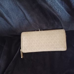 Mk wallet and backpack